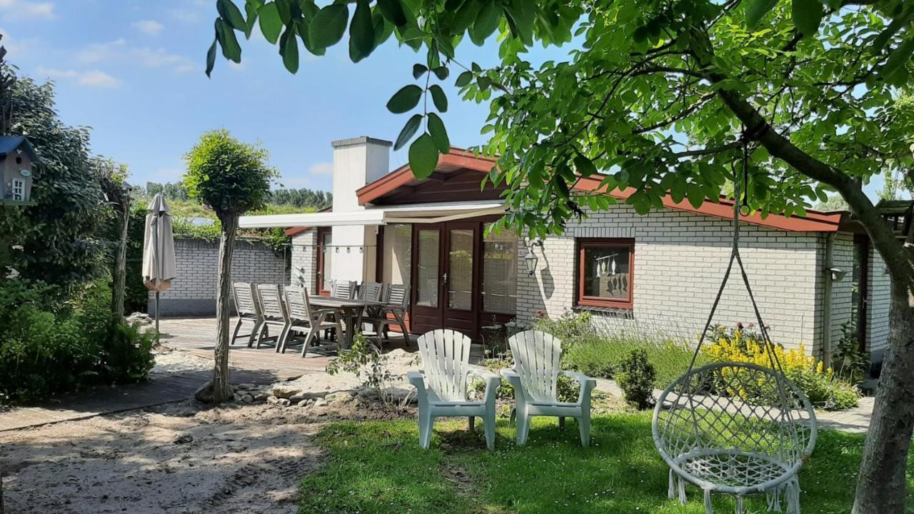 Bungalow De Pluumpot Scherpenisse Esterno foto